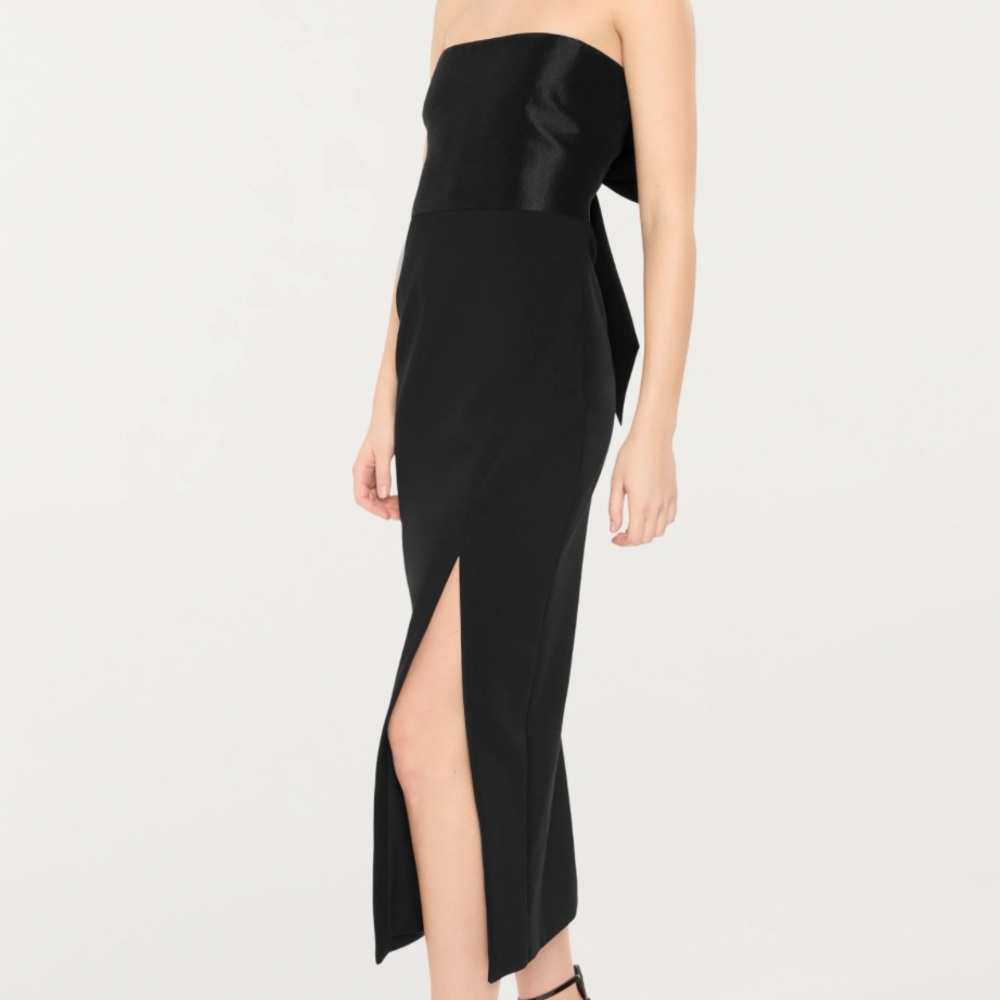 Black womans strapless evening midi dress with large bow detail on the back